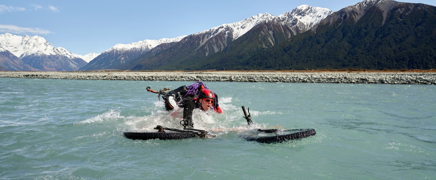 Malcolm McRae   Owen Daniell slipping in a very high Rakia River